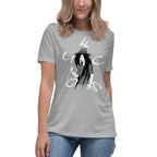 White, Grey and Black Graphic of young Lady wearing a hat with the letters of the word ' Focus ' scrambled around the Graphic