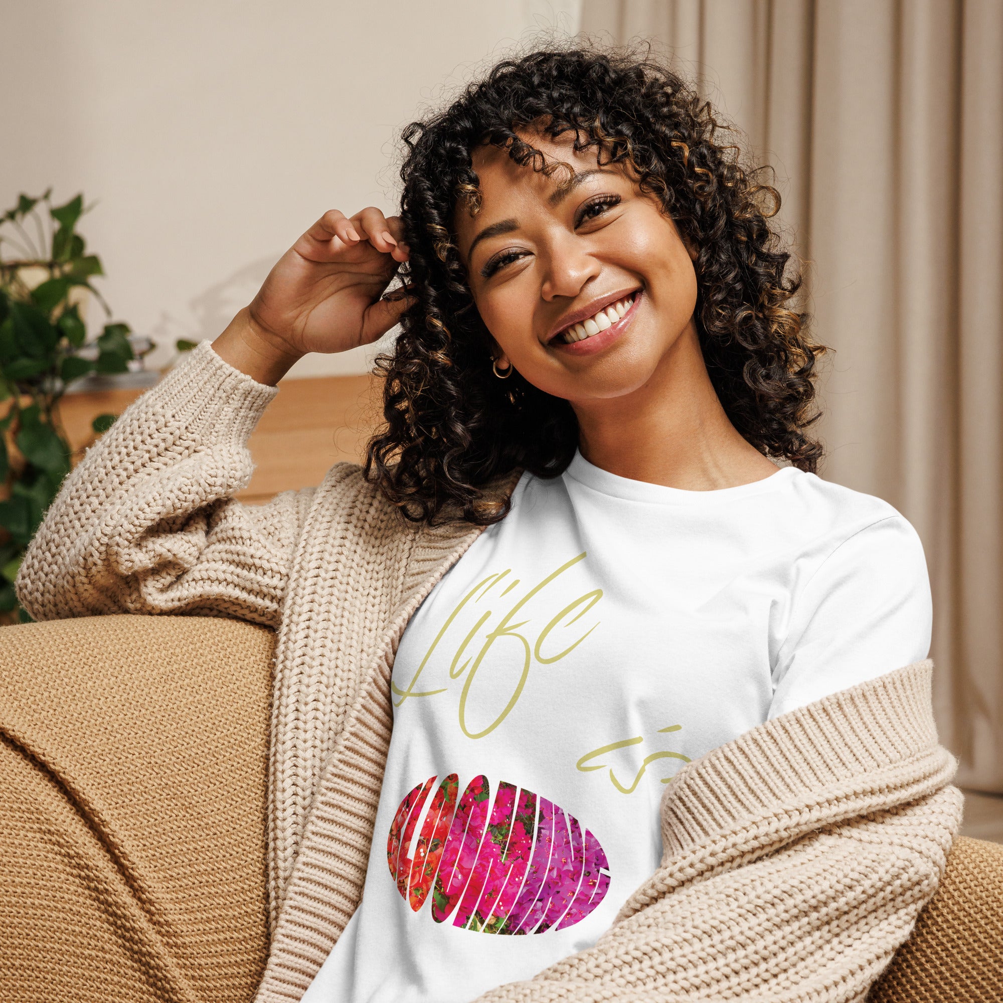 Phrase ' Life is Blooming ' with the word Blooming in a floral texture