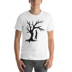 Dark colored tree graphic integrated with black silhouette of man wearing a hat 